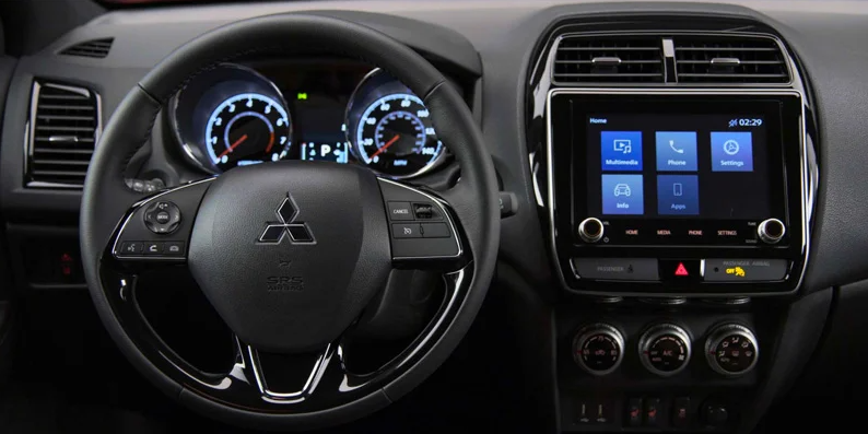 a photo of the dashboard of a 2024 Mitsubishi Outlander Sport.