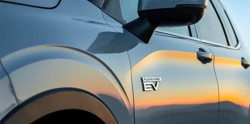 A close up of the side of a 2024 Mitsubishi Outlander sport.