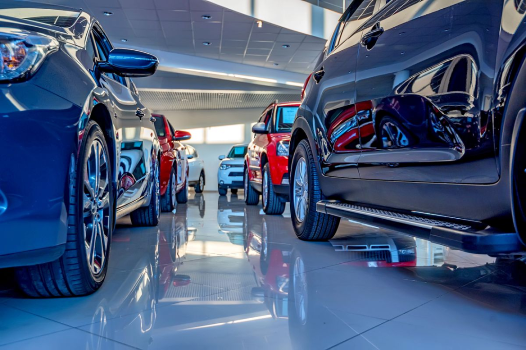A photo of the inside of a car dealership.