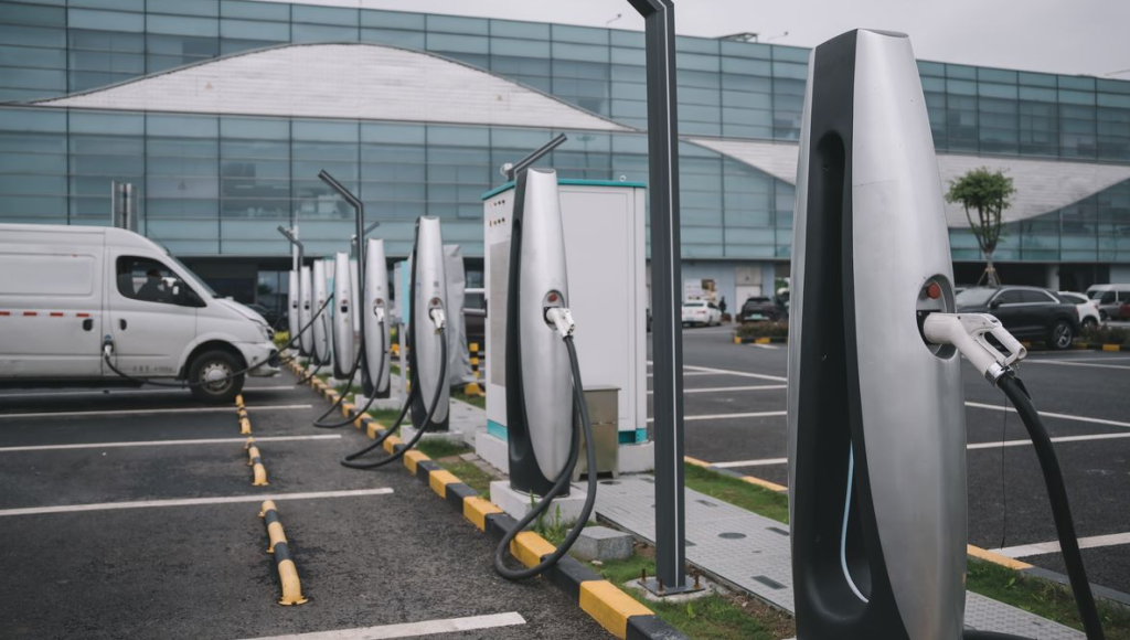 Photo of a parking lot with Electric Chargers.