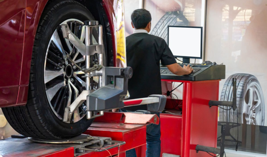 A vehicle getting a tire alignment.