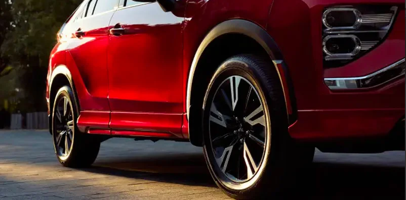A close up photo of a Red 2025 Mitsubishi Eclipse Cross.